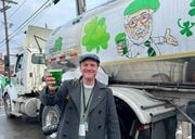Reporter Charlie Miller raises a glass to celebrate Green Beer Sunday 2023 at Coleman's Authentic Irish Pub. (Charlie Miller | cmiller@syracuse.com)