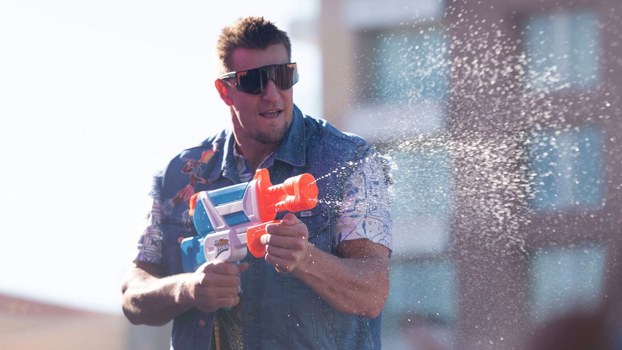 Rob Gronkowski Sprays New Yorkers With Water During a Super Bowl Event.