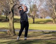 Syracuse University football player Jakob Bradford plays golf in short sleeves at Lyndon Golf Course on a record warm day for Fayetteville, NY February 9, 2024 as temperatures touched 60 degrees.  N. Scott Trimble | strimble@syracuse.com